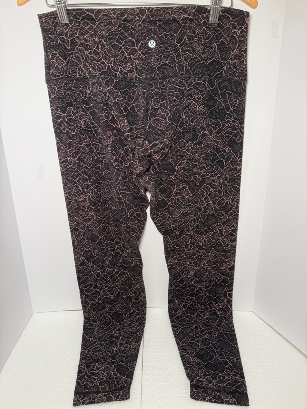 lululemon athletica Women’s Black Leggings with Pink Lace-Style Print